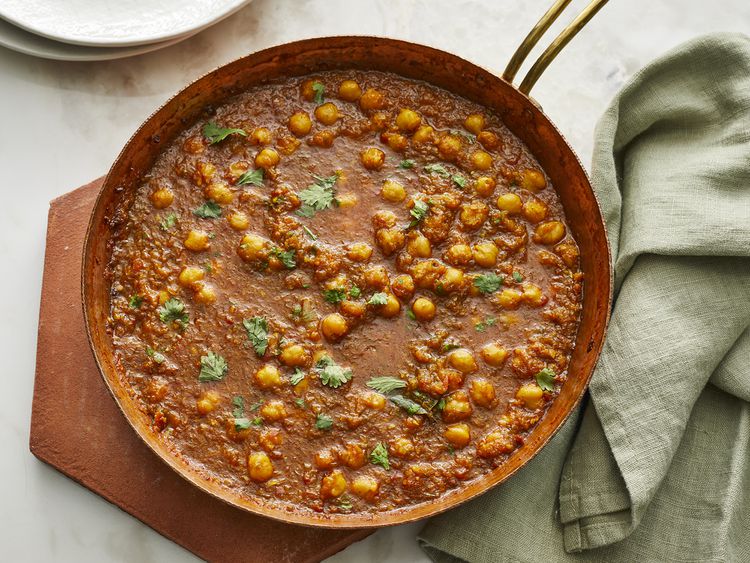 Chana Masala served in a metal pan