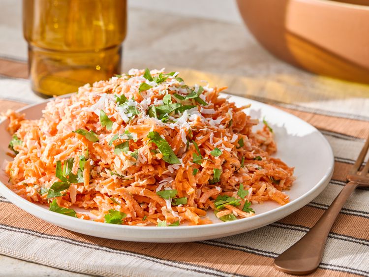 Shredded Carrot Coconut Salad with sprinkled corriander leaves